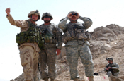 PANJWAYI, Afghanistan - Canadian Brig. Gen. David Fraser, RCS commander (left), Army Col. R. Stephen Williams, 207th Infantry Brigade commander (middle) and Army Maj. Gen. Benjamin Freakly, Combined Task Force 76 commander (right) gather in Pashmul during Operation Medusa to supervise combat operation on Sept. 11. (Photo by Army Sgt. Mayra Kennedy)