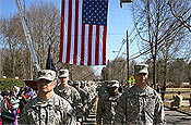 Soldiers of the 50th Personnel Services Battalion, 250th Personnel Services Detachment and the Afghan National Army Embedded Training Team (Task Force Phoenix) parade down Eggert Crossing Road in Lawrenceville, New Jersey. This was part of the Welcome Home Ceremony held at the National Guard Armory in Lawrenceville on March 9.