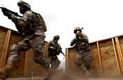 Soldiers from Headquarters and Headquarters Company, 58th Infantry Brigade Combat Team practice room clearing procedures during training on Military Operations in Urban Terrain at Fort Dix, N.J., Friday, May 11, 2007. The 58th IBCT is at Fort Dix training for deployment to Iraq. (U.S. Army Photo by Staff Sgt. Jon Soucy) (Released)