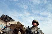  First Lt. Martin Schafer, a platoon leader with Company A, 1st Battalion, 149th Infantry Regiment, leads a ptrol through the Al Furat Section of Baghdad, Monday, Aug. 20, 2007. The unit conducts patrols through the area several times each day and have built a relationship with those who live in the area and through those relationships have helped rebuild marketplaces and other key places in the area.(U.S. Army photo by Staff Sgt. Jon Soucy) (Released)