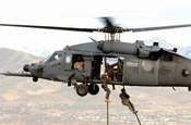  Army personnel from the Utah National Guard, 19th Special Forces unit are lifted on board an Air Force HH-60 Pave Hawk helicopter over the Utah Test and Training Range on Nov. 9, 2007 during a Combat Search and Rescue Integration Exercise held Nov. 6-15 in Utah. U.S. Air Force photo by Master Sgt. Kevin J. Gruenwald.