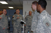 Gen. Peter W. Chiarelli, Vice Chief of Staff U.S. Army, talks to Soldiers of Camp Atterbury Joint Maneuver Training Center in Edinburgh, Ind. during a tour through the Soldier Readiness Center buildings with Lt. Col. Timothy Holtke, Indiana Adjutant General Maj. Gen. R. Martin Umbarger and other staff members Jan. 23, 2009. (U.S. Army photo by Sgt. Maj. Jodie Newby)