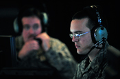 JOINT BASE BALAD, Iraq – Senior Airman Daniel Shaub, 727th Expeditionary Air Control Squadron air surveillance technician, concentrates on a screen depicting Iraqi air space in the Control Response Center, Jan. 29. Photo by Senior Airman Elizabeth Rissmiller