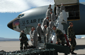 Arizona Air National Guard Security Forces troops load their deployment gear on a KC-135 tanker at Tucson International Airport. The Airmen assigned to the 162nd Fighter Wing hitched a ride with the 171st Air Refueling Wing on their way to Baghdad International Airport, Iraq, for a voluntary six-month tour of duty, Feb. 24. The Guardsmen, who provide full-time security for the 162nd Fighter Wing at Tucson International Airport, will use their training and expertise to secure Iraq’s largest airport. The Airmen are scheduled to return to Tucson in early September. Photo by Capt. Gabe Johnson 162nd Fighter Wing Public Affairs