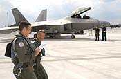 Lieutenant Colonel David Nardi (right), of the 192nd Fighter Wing, Virginia Air National Guard, and an unidentified pilot heads out to the flightline at Langley AFB, Virginia to fly a local training mission. (USAF Photo/MSgt Gerold O. Gamble)