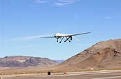 Predator Unmanned Aerial Vehicle crews fly training missions at the Creech AFB, Nevada training site. The Predator provides armed battlefield reconnaissance and support for ground assets in the global war on terror. (USAF Photo/Master Sgt. Gerold O. Gamble)