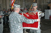  Lt. Col. Mitchell Passini and Command Sgt. Maj. Will Pierce of Missouri Army National Guard's 110th Engineer Battalion case the unit's colors during a transfer of authority ceremony at Camp Striker, Iraq, Nov. 1, 2006. The Arkansas Army National Guard's 875th Engineer Battalion formally took the reins of a critical route clearance mission for the 411th Engineer Brigade. (U.S. Army photo by Staff Sgt. Chris A. Durney, 875th Engineer Battalion Public Affairs)
