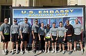 Soldiers from the 36th Combat Aviation Brigade take a photo near the U.S. Embassy in Baghdad, Iraq, before running the 2006 Veterans Day International Zone Marathon Nov. 11. (U.S. Army photo by Master Sgt. Charles A. Wheeler)