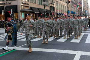 New York Army National Guard Lt. Col. John Andonie, commander of the 1st Battalion, 69th Infantry leads his battalion up Fifth Avenue towards St. Patrick's Cathedral, March 17, in New York City during the city's Saint Patrick's Day celebration.